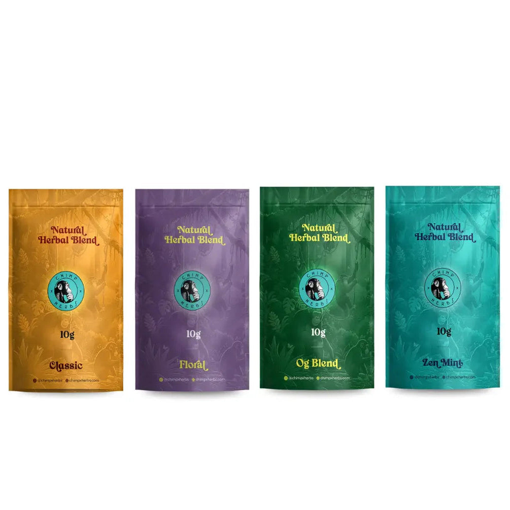 Four stand-up pouches of Natural Herbal Blend tea arranged in a row on a white background, each in a different color: orange-gold, purple, green, and teal.