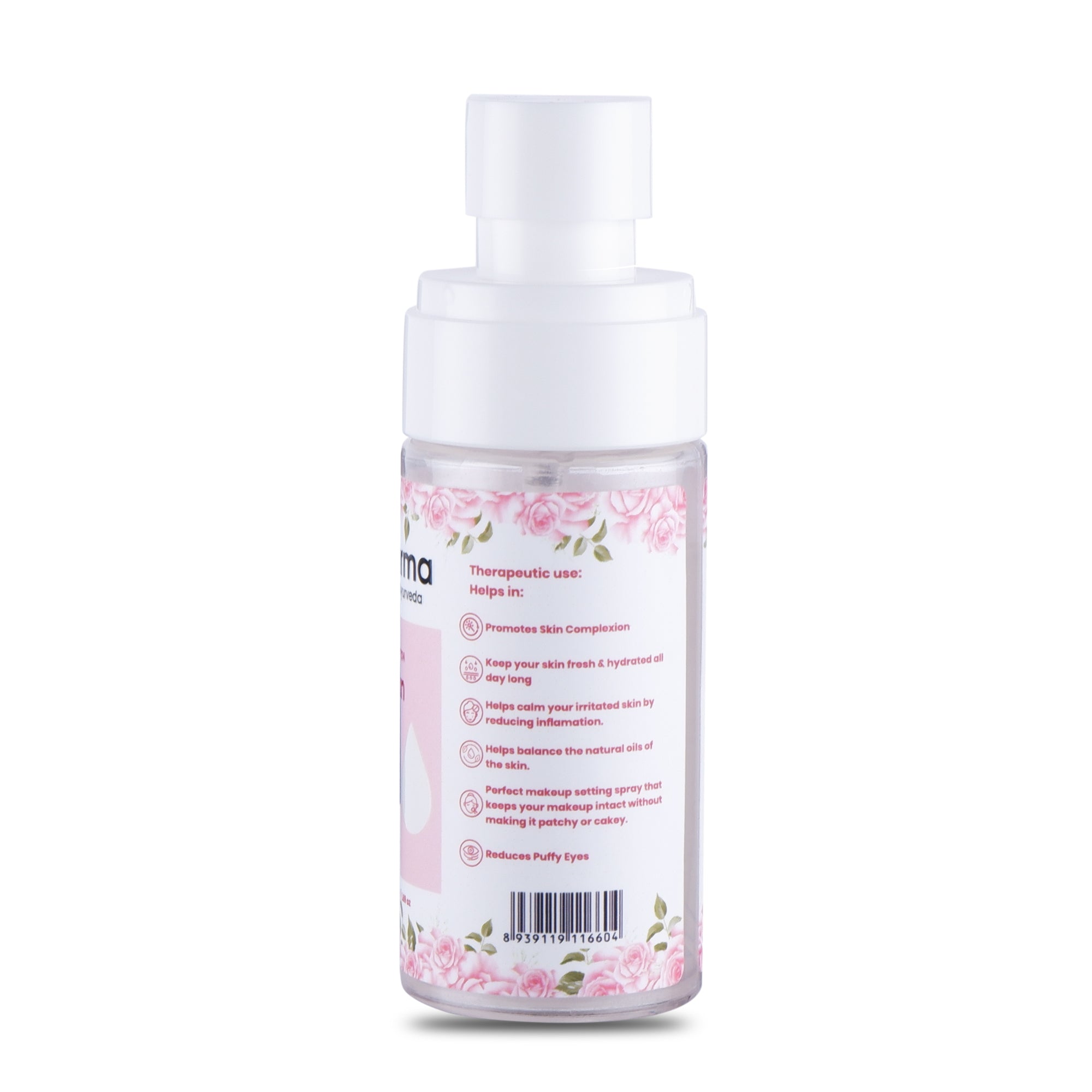 Clear spray bottle with white pump and pink rose label showing therapeutic uses