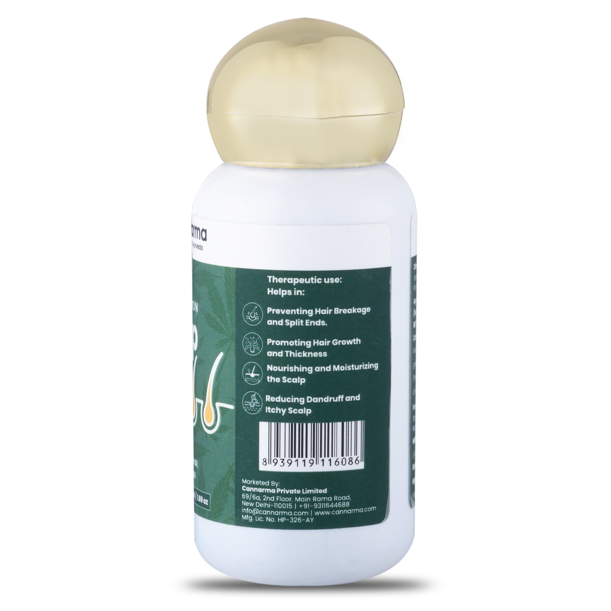 White bottle with gold cap showing back label listing therapeutic uses for hair care