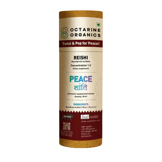 Oclarine Organics Reishi supplement container on a wooden surface with a light gray background