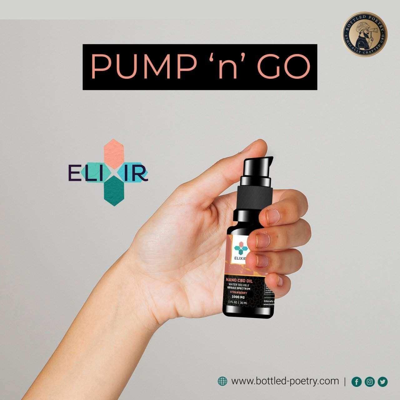 Hand holding a black Elixir Nano CBD Oil spray bottle