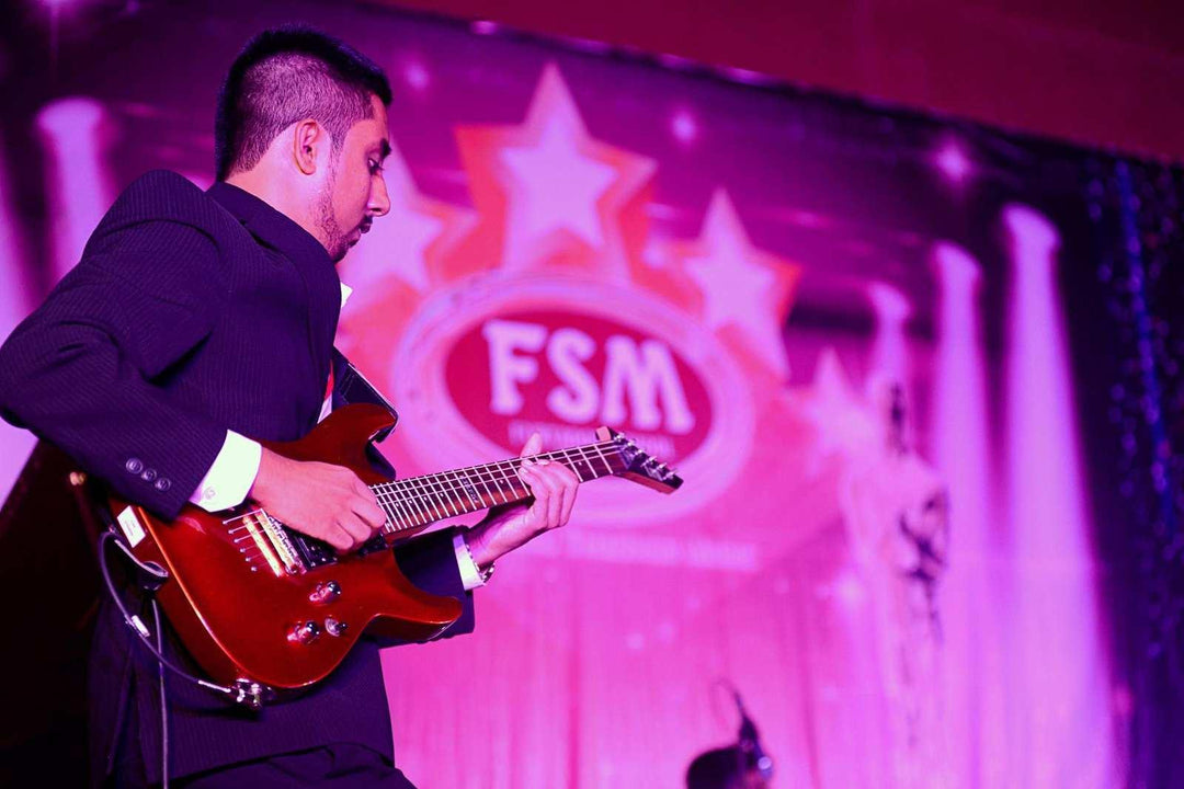 Guitar & Piano Lessons with AmanLearn Guitar & Piano with Aman | Experienced Mentor