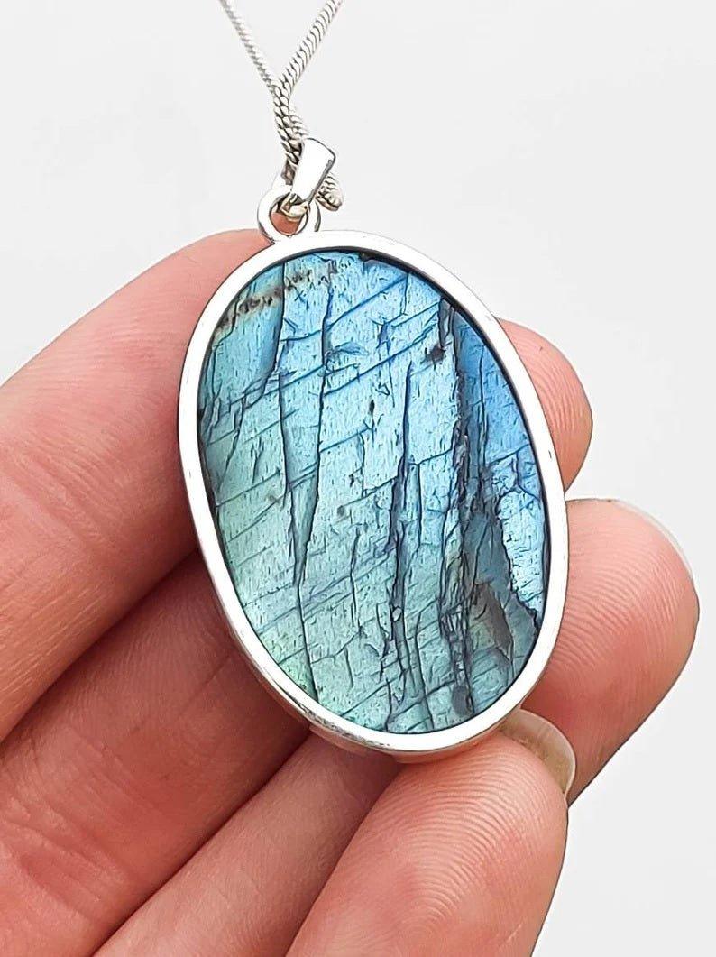 Premium Quality Deep Blue and Aqua Flash Oval Labradorite Sterling Silver Pendant NecklaceGemstones and CrystalPremium Quality Deep Blue and Aqua Flash Oval Labradorite Sterling Silver Pendant Necklace