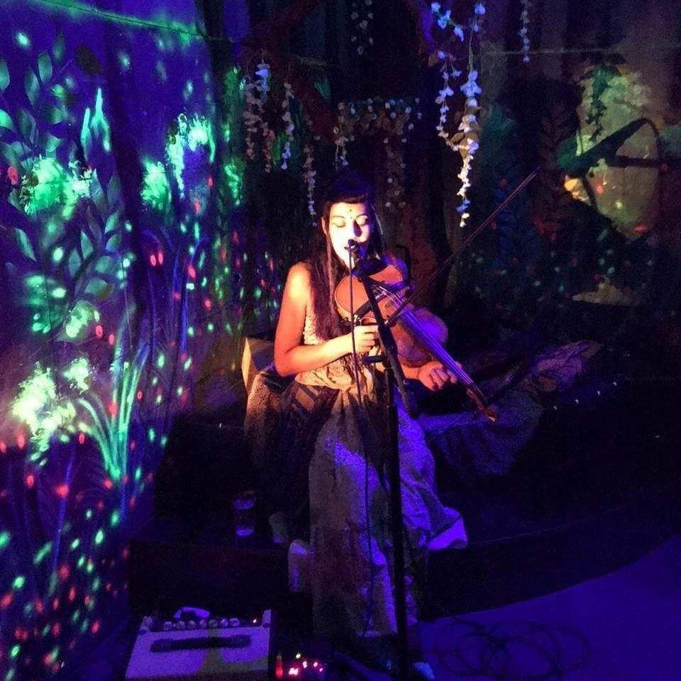 Violin lessons with Tamara Kazziha.